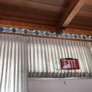 The stained glass was designed and a gift from the woman who did the glasswork at the Guardian Angel Cathedral.