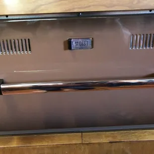 A bun warmer.  Pull out the drawer and put in the buns.