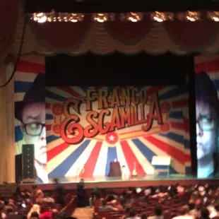 a stage with a giant banner