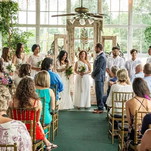 My handsome husband. My sons are the groomsmen, my daughters, sister, best friend are my bridesmaids.