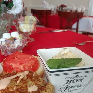 Crab cake sandwich and potato salad.