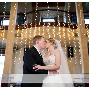 The bride and groom with perfectly designed backlights