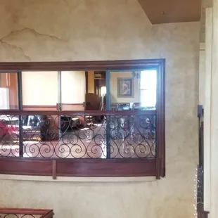 Upstairs side room with bar available, that overlooks main area.