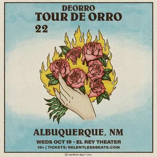 a hand holding a bouquet of flowers