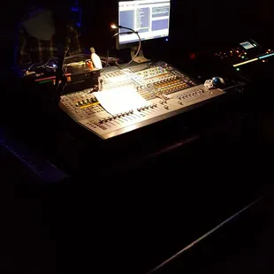 a stage with a monitor and keyboard