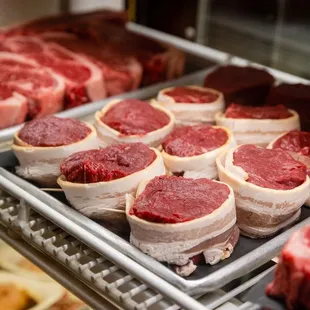a display of raw meat