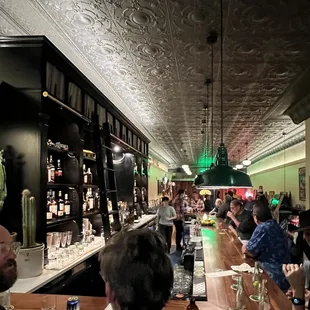 people sitting at the bar