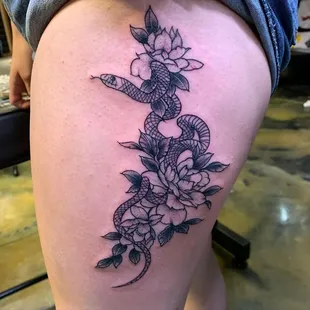 Snake and flowers by Brit
