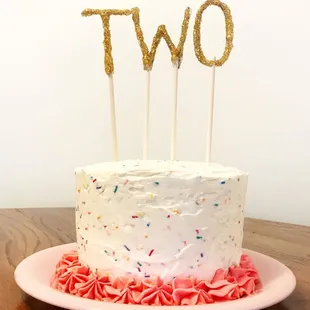 Momma made the topper. The Hive made the cake. And the sweet little two year old loved every strawberry funfetti bite
