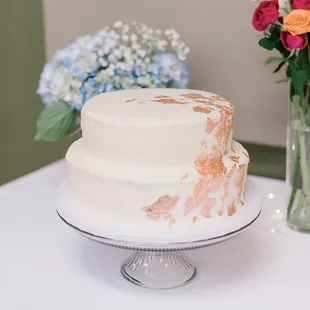 Our wedding cake with lemon cake, vanilla icing, and berry filling. Oh, and completely dairy free!!