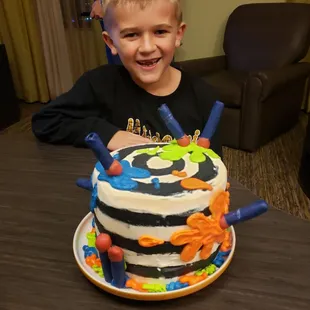 Landry with his Nerf themed birthday cake.