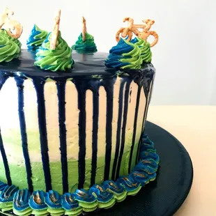 Triple-layer white cake with strawberries and vanilla buttercream between each layer