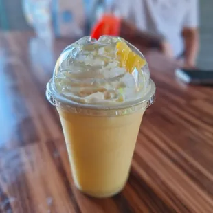 a smoothie in a plastic cup