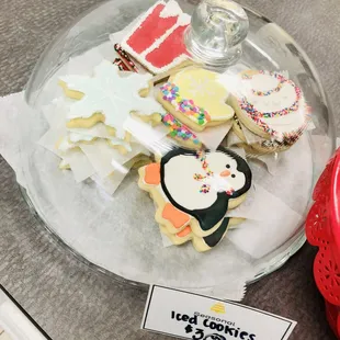 a plate of decorated cookies