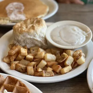Biscuits and gravy and potatoes, pancakes