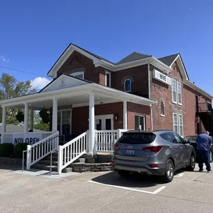 a car parked in front of a house