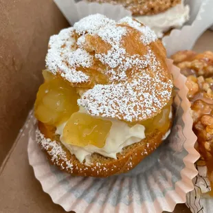 three pastries in a box