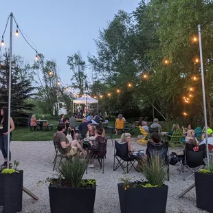 a group of people sitting outside