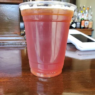 a drink in a plastic cup