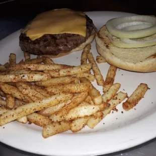 Cheese burger 1/2 lb. Black Angus with Cajun fries