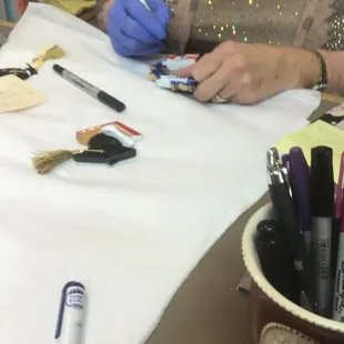 So cute, they sell Christmas ornaments and will personalize them for you on the spot!