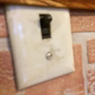 This is a filthy light switch that was at our table.