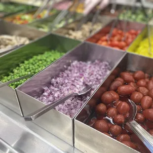 a variety of vegetables in a buffet