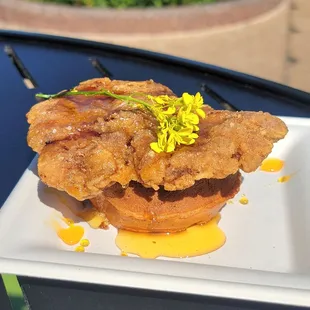 Chicken &amp; Waffles (crispy chicken and cornbread waffle with whipped honey butter and spicy honey)