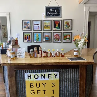 a sign for honey buy 3 get 1 free