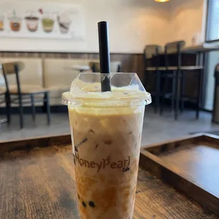 a cold drink in a plastic cup