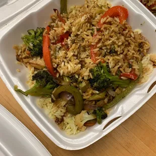a meal in a styrofoam container