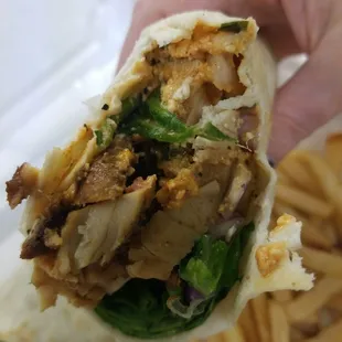 Feisty Greek wrap. Spicy feta, grilled chicken, spinach and red onion