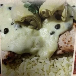 Chicken lemonato sautéed in white wine,butter,lemon artichokes,capers and served over rice