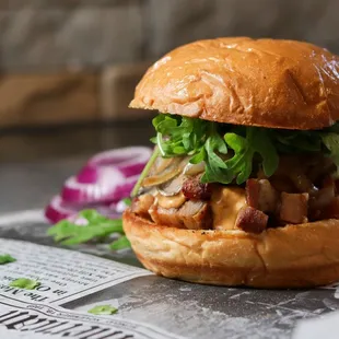 a sandwich on a newspaper