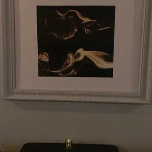 a lit candle on a table