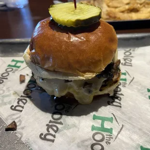 Medium well burger with caramelized onions and mushrooms, provolone cheese with special sauce.