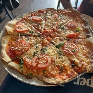 Margherita Pizza made in stone oven.