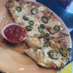 Cheese bread with Jalapeños and red sauce.  Very good