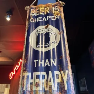The Hopper Pub &amp; Pizzeria.  A very true sign.