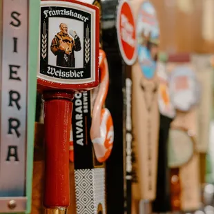 a row of beer taps