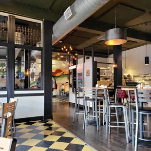 a restaurant with a checkered floor