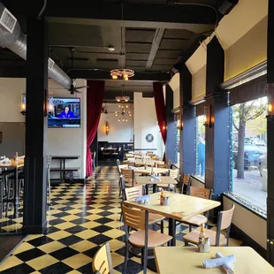 a restaurant with a checkered floor