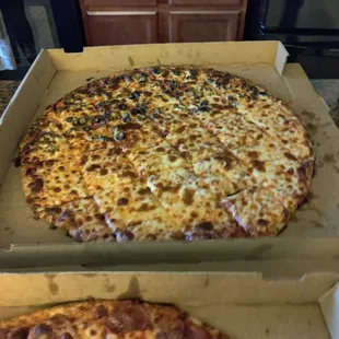 Half black olives, half extra cheese 18&quot; pizza