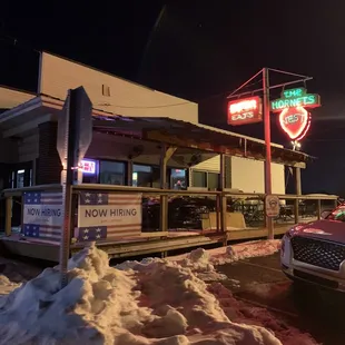 a car parked in front of the restaurant