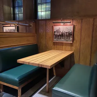 a booth with a table and benches