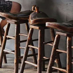 a woman sitting at a bar