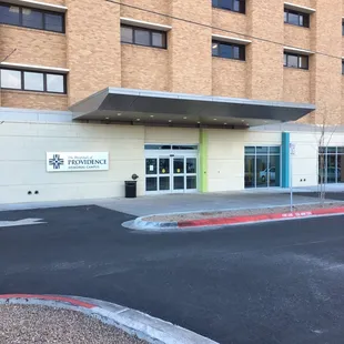 Entrance in the back. Follow the signs that say "Information" to get Registered