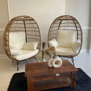 two chairs and a coffee table