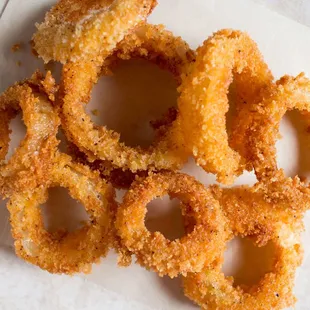 a pile of fried onion rings