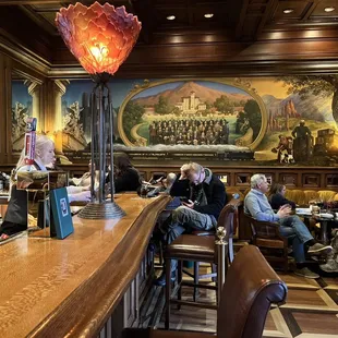 people sitting at the bar